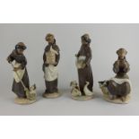 Four Lladro figures of monks with various animals, tallest 23cm high