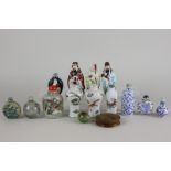 A collection of Chinese scent bottles, together with three Chinese figures and other ornaments