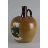 A Royal Doulton stoneware flagon, Special Highland Whiskey, 23cm