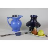 A Carlton Ware cruet set in the shape of fruit, together with a C M Brannam jug, a glass lustre vase