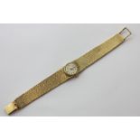 A lady's 9ct gold Omega bracelet watch