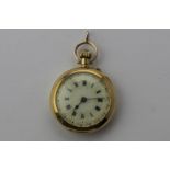 A lady's Swiss 18ct gold small fob watch