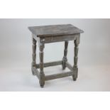 A 17th century oak joint stool, 55cm high (NC)