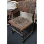 A Cromwellian style single chair with embossed leather back and seat (distressed), on spiral