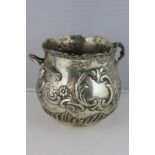 A Continental silver pot marked 800, with embossed cherub, floral and scroll decoration, vacant