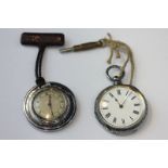 A Victorian lady's silver pocket watch with engraved cover, 6cm and a nurses's steel fob watch