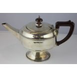 A George V silver teapot, Birmingham 1933, plain circular body, 13.6oz