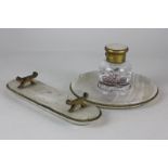 A gilt metal mounted glass inkwell on circular marble base, 17cm; and a matching pen stand (a/f) (