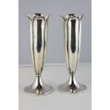 A pair of George V silver bud vases, maker Edward Souter, Barnsley Birmingham 1912, with loaded