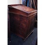 A Victorian Davenport desk with slide, four long drawers and one short drawer, 54cm