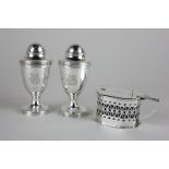 A pair of Edwardian silver peppers, maker Edward Barnard and Sons Ltd, together with a Victorian