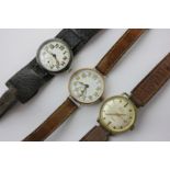 A silver cased wrist watch, London 1928, and two other watches