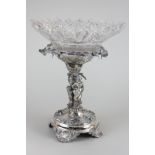 A Victorian centrepiece with silver plated support of a lady dancing under a grapevine, with a cut