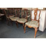 A set of four Dutch marquetry dining chairs with upholstered seats on cabriole legs, and a similar