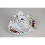 An East German porcelain inkwell with scroll and floral form, gilt enrichment 15cm wide