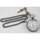 A silver cased Kendal and Dent pocket watch with white enamel dial and Roman numerals, with silver