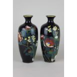 A pair of cloisonne vases, ovoid bodies with floral decoration and dark blue ground, 18cm high, (a/