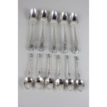 Six Victorian Continental silver apostle coffee spoons, import marks for London 1900, together