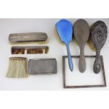 Three Victorian silver backed dressing table brushes, two clothes brushes and other silver