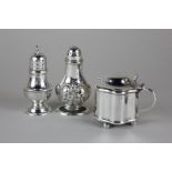 A Victorian silver pepper, Sheffield 1898, together with another pepper and mustard with blue