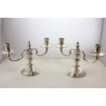 A pair of modern silver two branch candelabra, London 1972, weighted, ,17cm tall