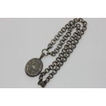 A silver locket on a chain