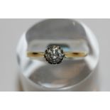 A diamond single stone ring the round brilliant cut stone in white gold on 18ct gold shank