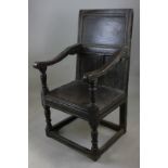 A 17th century oak wainscot chair with double carved back (NC)