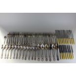 A set of twelve silver plated Kings pattern table forks, dessert forks and dessert spoons,