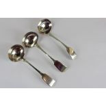 A pair of William IV fiddle pattern silver sauce ladles, London 1830, together with another