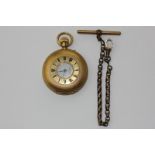 A lady's 18ct gold half hunter fob watch, engine turned on a gilt chain