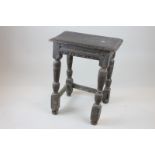 A 17th century oak joint stool (stretcher rails missing) (NC)