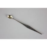 A Victorian silver ear scoop and probe, gilt bowl, Birmingham 1864, maker's mark of HM