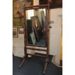 A 19th century mahogany cheval mirror on splayed leg stand (NC)