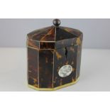 A George III tortoiseshell tea caddy, faceted oval form with domed cover (a/f), 13cm