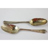 Two 18th century silver tablespoons, now as serving spoons, with later Victorian decoration of