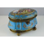 A 19th century French 'Sevres' style porcelain box, the top decorated with lovers, 20cm wide (NC)