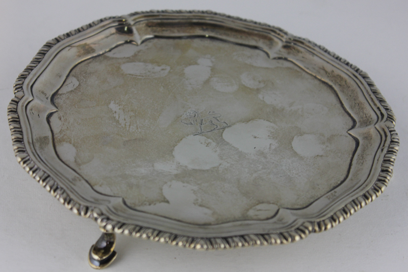 A George III silver card tray, maker Thomas Hannam and Richard Mills, London 1764, with raised