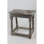 A 17th century oak joint stool, 49cm high (NC)