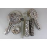 Assorted Victorian and later dressing table items including a silver backed mirror, brush and