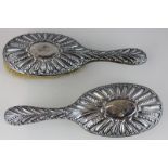 A pair of Victorian silver backed hair brushes, London 1892, monogrammed (a/f)