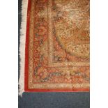 An Iranian Qum hand-knotted silk carpet in pink, blue and cream all-over floral pattern, with
