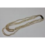 A three row cultured pearl necklace on silver and marcasite clasp (NC)