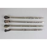 Four South American Mate pipes, hollow stems and pierced bowls, one stamped 800, another guarantino,