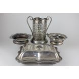 Two Victorian silver plated wine coasters on wooden bases, a rectangular entree dish with shaped