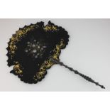 A Victorian papier mache fan with mother of pearl floral and gilt decoration, 42cm