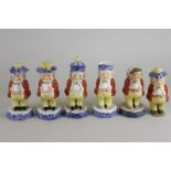 Six Staffordshire pottery willow pattern condiments in the shape of portly gentlemen drinking ale,