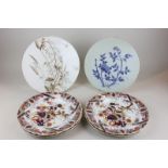 Four Masons Ironstone china plates decorated with birds in foliage 26cm diameter together with two