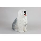 A large Beswick porcelain model of an Old English sheep dog, 30cm high
