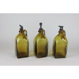 Three 19th century yellow glass jugs engraved with 'Whisky', 'Rum' and 'Gin', with three different